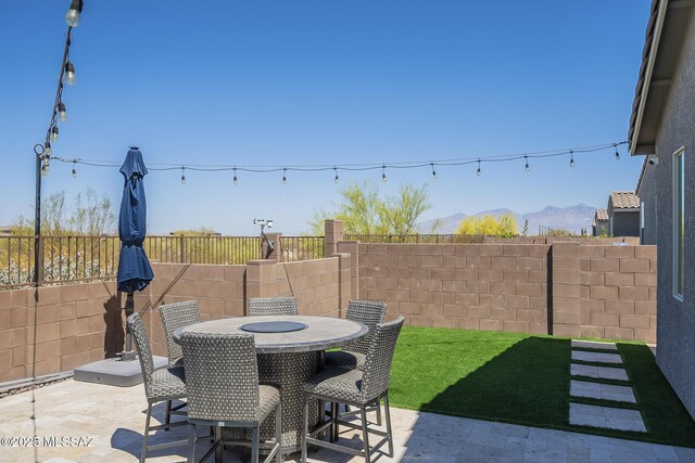 5550 S Sycamore Rim Trl, Tucson, AZ 85747 - view of patio with a mountain view and outdoor dining space