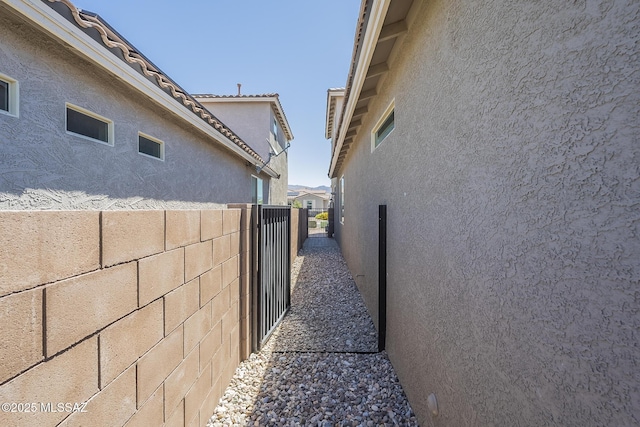 5550 S Sycamore Rim Trl, Tucson, AZ 85747 - view of side of home with stucco siding