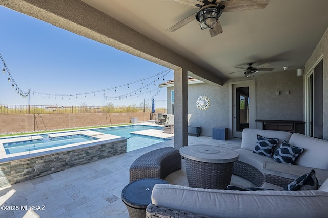 5550 S Sycamore Rim Trl, Tucson, AZ 85747 - fenced backyard featuring an in-ground hot tub, ceiling fan, an outdoor living space, and a patio