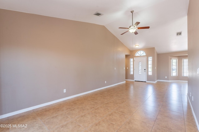 9701 N Camino Del Fierro, Tucson, AZ 85742 - unfurnished living room with a ceiling fan, baseboards, high vaulted ceiling, and light tile patterned flooring