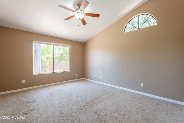 9701 N Camino Del Fierro, Tucson, AZ 85742 - carpeted empty room featuring vaulted ceiling, a ceiling fan, and baseboards