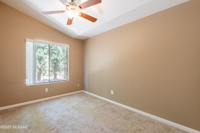 9701 N Camino Del Fierro, Tucson, AZ 85742 - carpeted spare room featuring lofted ceiling, baseboards, and a ceiling fan