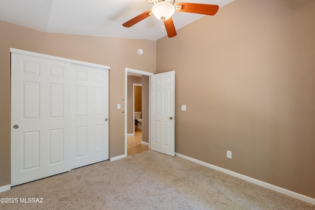 9701 N Camino Del Fierro, Tucson, AZ 85742 - unfurnished bedroom featuring carpet, baseboards, a closet, a ceiling fan, and high vaulted ceiling