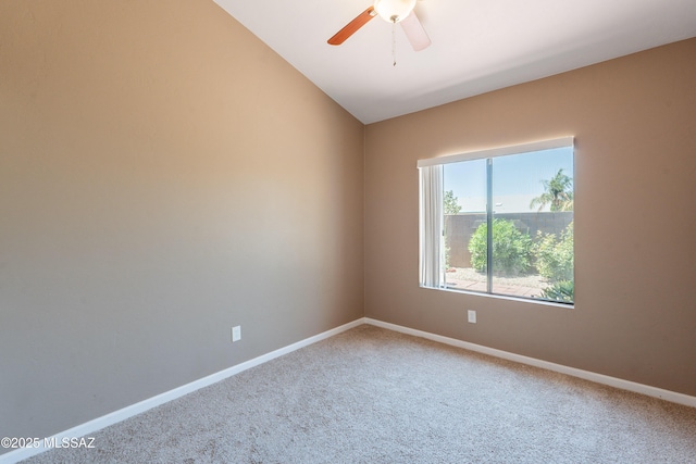 9701 N Camino Del Fierro, Tucson, AZ 85742 - carpeted spare room featuring a ceiling fan, baseboards, and vaulted ceiling