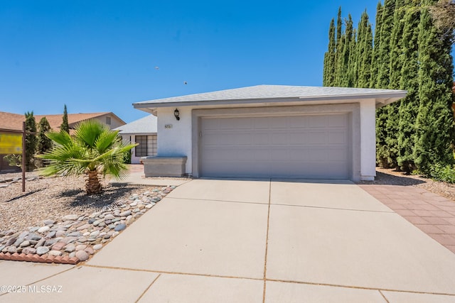 9701 N Camino Del Fierro, Tucson, AZ 85742 - view of front of house with stucco siding