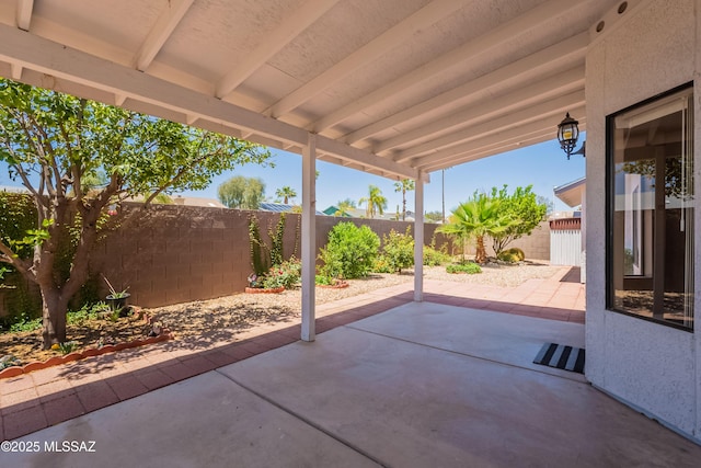 9701 N Camino Del Fierro, Tucson, AZ 85742 - fenced backyard featuring a patio