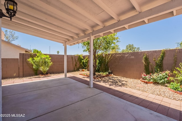 9701 N Camino Del Fierro, Tucson, AZ 85742 - fenced backyard with a patio
