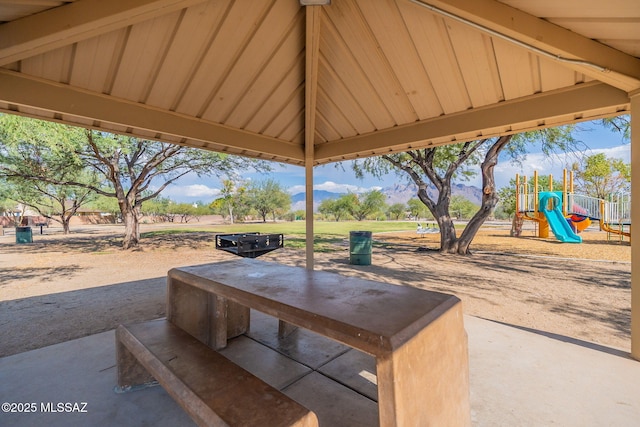 9701 N Camino Del Fierro, Tucson, AZ 85742 - view of patio / terrace with a playground