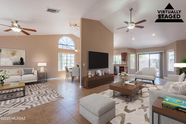 9701 N Camino Del Fierro, Tucson, AZ 85742 - tiled living area featuring a ceiling fan, healthy amount of natural light, baseboards, recessed lighting, and high vaulted ceiling