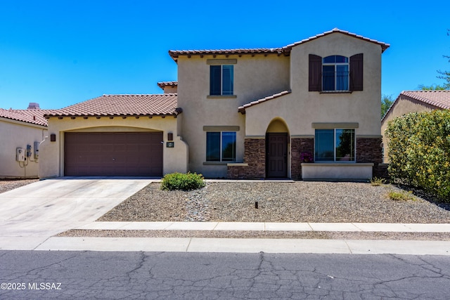 19 W Via Teresita, Sahuarita, AZ 85629 - mediterranean / spanish house featuring a tiled roof, stucco siding, a garage, and concrete driveway