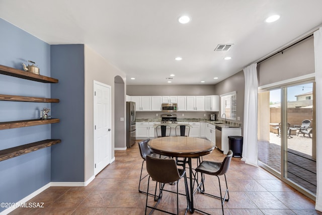 19 W Via Teresita, Sahuarita, AZ 85629 - dining area with baseboards, recessed lighting, and tile patterned floors