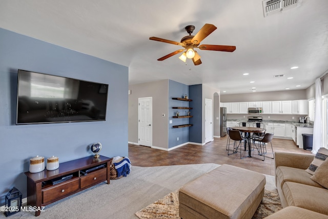 19 W Via Teresita, Sahuarita, AZ 85629 - living area featuring ceiling fan, light tile patterned floors, recessed lighting, and baseboards