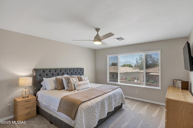 19 W Via Teresita, Sahuarita, AZ 85629 - bedroom featuring light colored carpet, baseboards, and ceiling fan