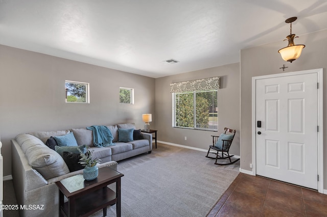 19 W Via Teresita, Sahuarita, AZ 85629 - living area with baseboards and dark tile patterned flooring