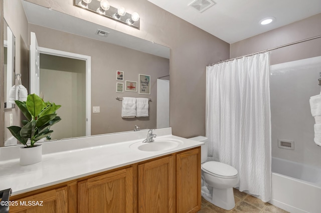 19 W Via Teresita, Sahuarita, AZ 85629 - bathroom with toilet, vanity, shower / tub combo with curtain, and tile patterned flooring