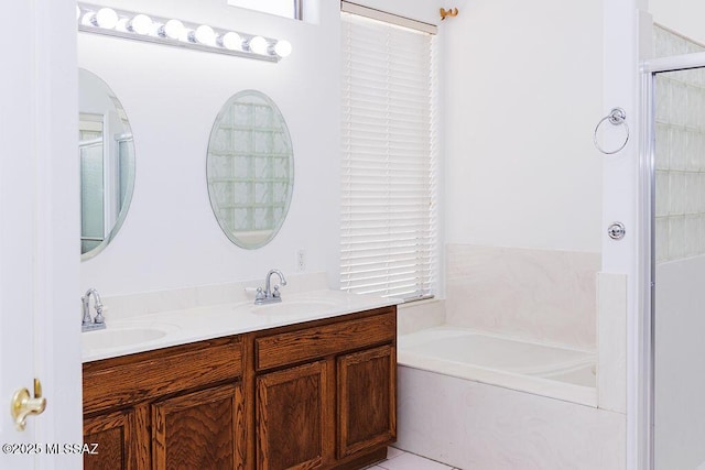 161 N Carlilse Way, Willcox, AZ 85643 - bathroom with a bath, double vanity, and a shower with door