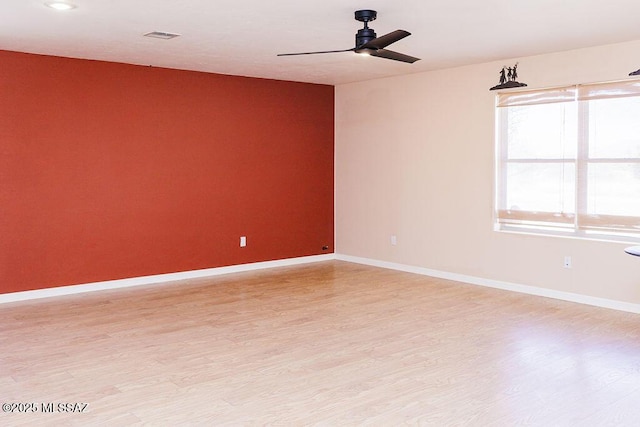 161 N Carlilse Way, Willcox, AZ 85643 - spare room featuring a ceiling fan, light wood finished floors, and baseboards