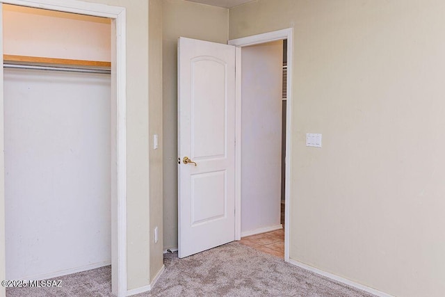 161 N Carlilse Way, Willcox, AZ 85643 - unfurnished bedroom featuring carpet flooring, a closet, and baseboards