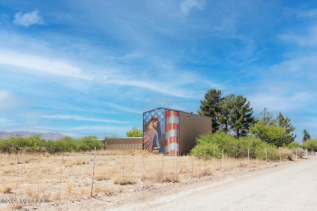 161 N Carlilse Way, Willcox, AZ 85643 - view of side of property with a pole building, an outdoor structure, and a mountain view