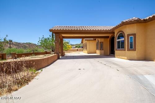 480 Camino Ramanote, Rio Rico, AZ 85648 - view of patio with concrete driveway