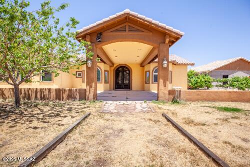 480 Camino Ramanote, Rio Rico, AZ 85648 - view of exterior entry with stucco siding