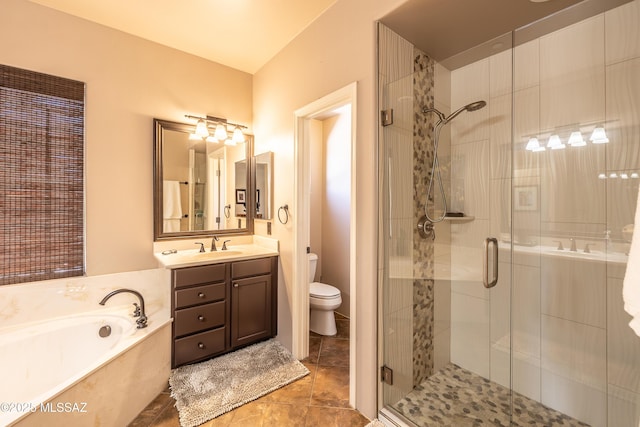 9387 S Via Famero, Vail, AZ 85641 - full bathroom featuring a shower stall, a bath, vanity, and toilet