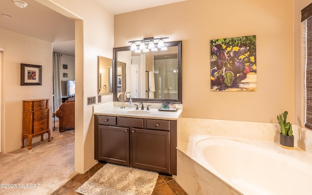9387 S Via Famero, Vail, AZ 85641 - bathroom with vanity, a garden tub, tile patterned flooring, and ensuite bath