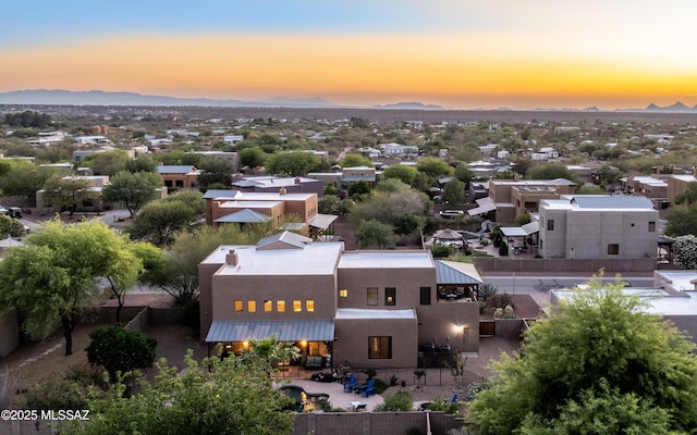 9387 S Via Famero, Vail, AZ 85641 - aerial view at dusk of a mountain view and a residential view