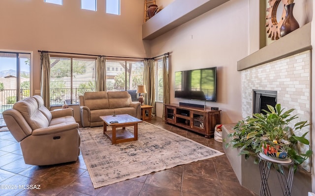 9387 S Via Famero, Vail, AZ 85641 - living room with a towering ceiling and a fireplace