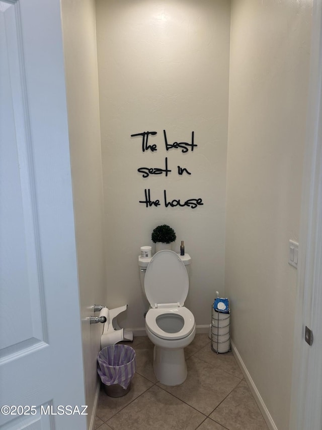 10822 E Franklin Falls Way, Vail, AZ 85641 - bathroom featuring toilet, tile patterned flooring, and baseboards