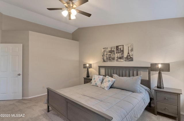11561 N Eagle Peak Dr, Oro Valley, AZ 85737 - bedroom with light carpet, lofted ceiling, baseboards, and ceiling fan
