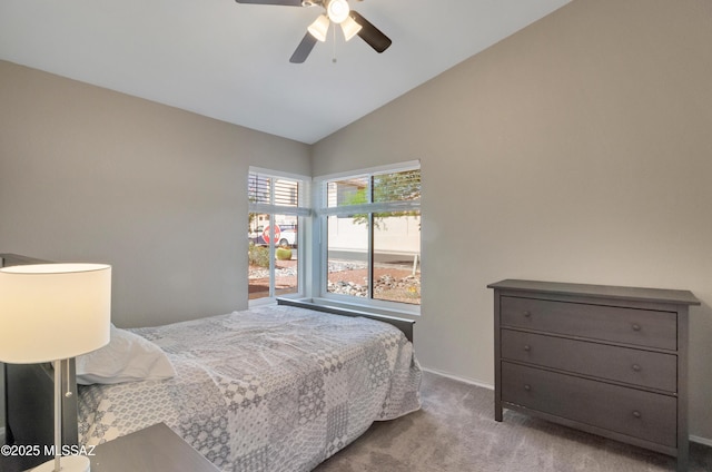 11561 N Eagle Peak Dr, Oro Valley, AZ 85737 - carpeted bedroom with vaulted ceiling, baseboards, and ceiling fan