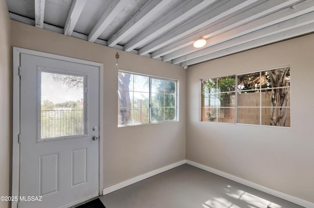 11561 N Eagle Peak Dr, Oro Valley, AZ 85737 - entryway featuring baseboards and beam ceiling