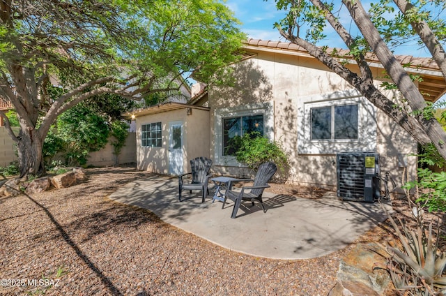 11561 N Eagle Peak Dr, Oro Valley, AZ 85737 - back of property with cooling unit, stucco siding, a patio, and a tiled roof