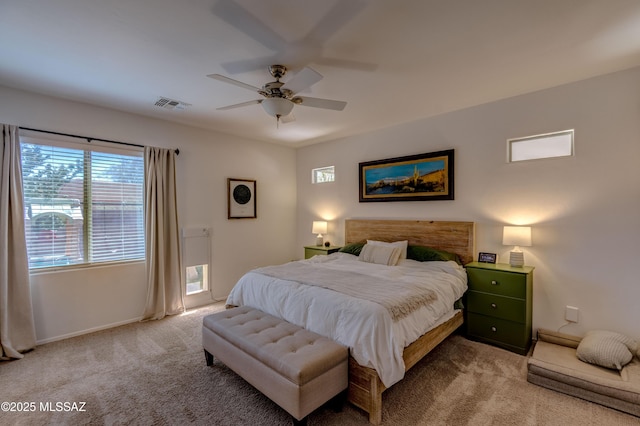 9978 N Niobrara Way, Tucson, AZ 85742 - bedroom with light carpet, baseboards, and ceiling fan