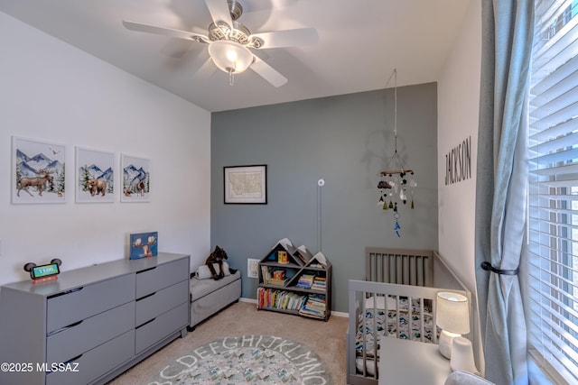9978 N Niobrara Way, Tucson, AZ 85742 - bedroom featuring light carpet, baseboards, and a ceiling fan