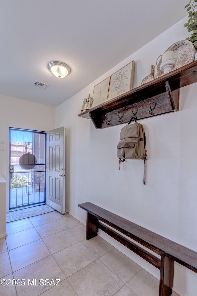 9978 N Niobrara Way, Tucson, AZ 85742 - mudroom featuring light tile patterned flooring and baseboards