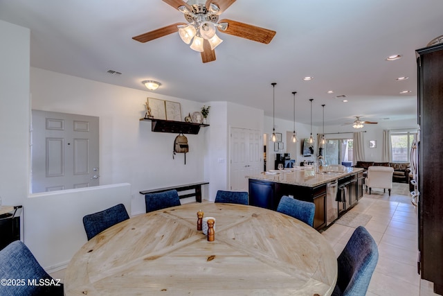 9978 N Niobrara Way, Tucson, AZ 85742 - dining room featuring a ceiling fan, light tile patterned flooring, and recessed lighting