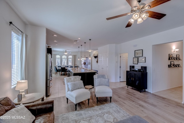 9978 N Niobrara Way, Tucson, AZ 85742 - living area with ceiling fan, light wood-style flooring, recessed lighting, and baseboards