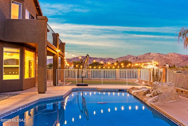 11262 N Chynna Rose Pl, Oro Valley, AZ 85737 - view of swimming pool with a mountain view and a patio