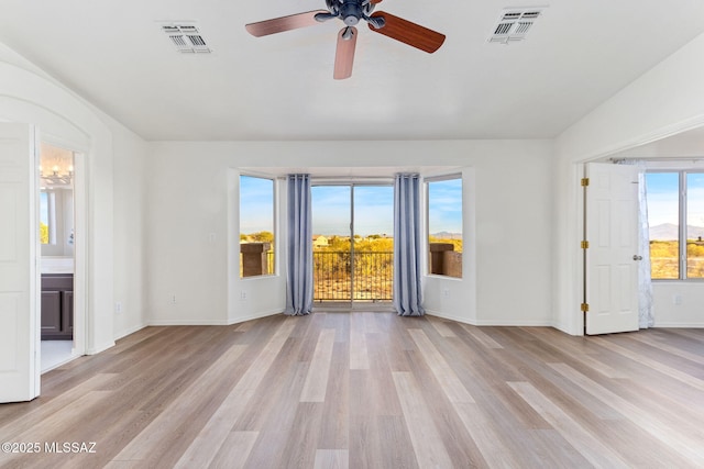 11262 N Chynna Rose Pl, Oro Valley, AZ 85737 - empty room featuring light wood-style floors, ceiling fan, and baseboards