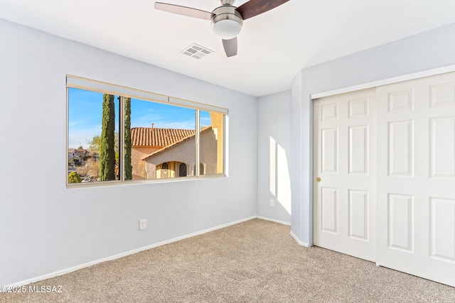 11262 N Chynna Rose Pl, Oro Valley, AZ 85737 - unfurnished bedroom with carpet floors, a closet, baseboards, and ceiling fan