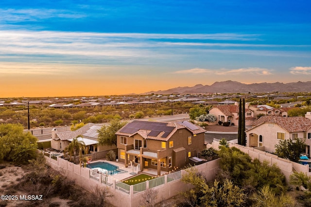 11262 N Chynna Rose Pl, Oro Valley, AZ 85737 - aerial perspective of suburban area featuring a pool and a mountainous background