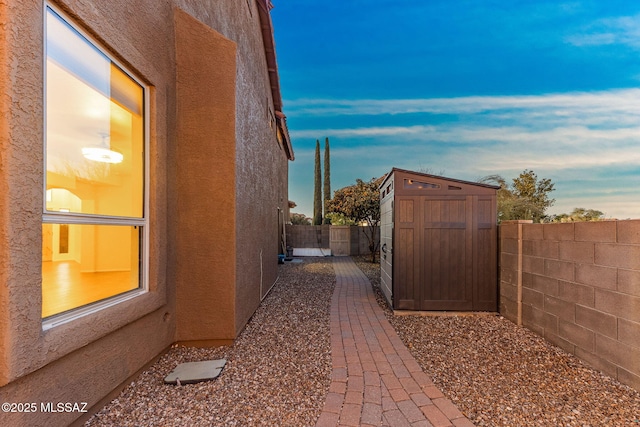 11262 N Chynna Rose Pl, Oro Valley, AZ 85737 - view of property exterior with a fenced backyard and stucco siding