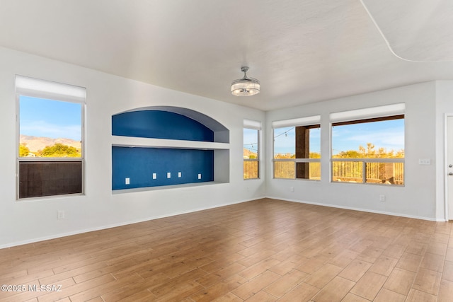 11262 N Chynna Rose Pl, Oro Valley, AZ 85737 - empty room featuring wood finished floors and baseboards