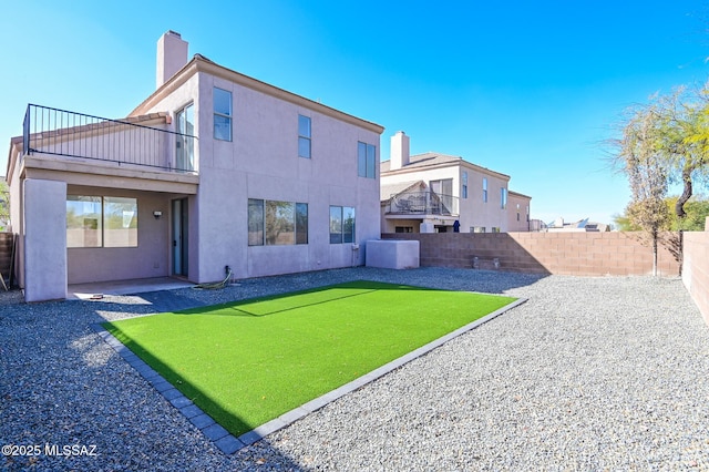 185 E Calle Zavala, Tucson, AZ 85704 - rear view of property featuring a balcony, a fenced backyard, a patio, and stucco siding