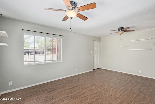2113 N Belvedere Ave, Tucson, AZ 85712 - spare room featuring a ceiling fan, wood finished floors, and baseboards