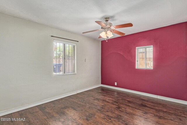 2113 N Belvedere Ave, Tucson, AZ 85712 - empty room featuring wood finished floors, baseboards, and a ceiling fan