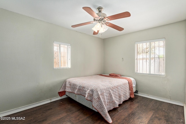 2113 N Belvedere Ave, Tucson, AZ 85712 - bedroom featuring wood finished floors, baseboards, and a ceiling fan