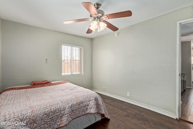 2113 N Belvedere Ave, Tucson, AZ 85712 - bedroom featuring wood finished floors, baseboards, and a ceiling fan